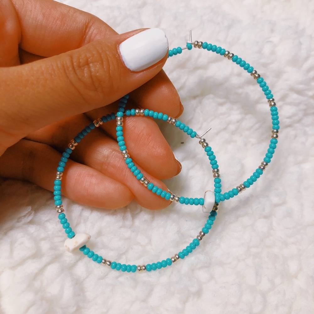 Handmade shell earring hoops with teal beading
